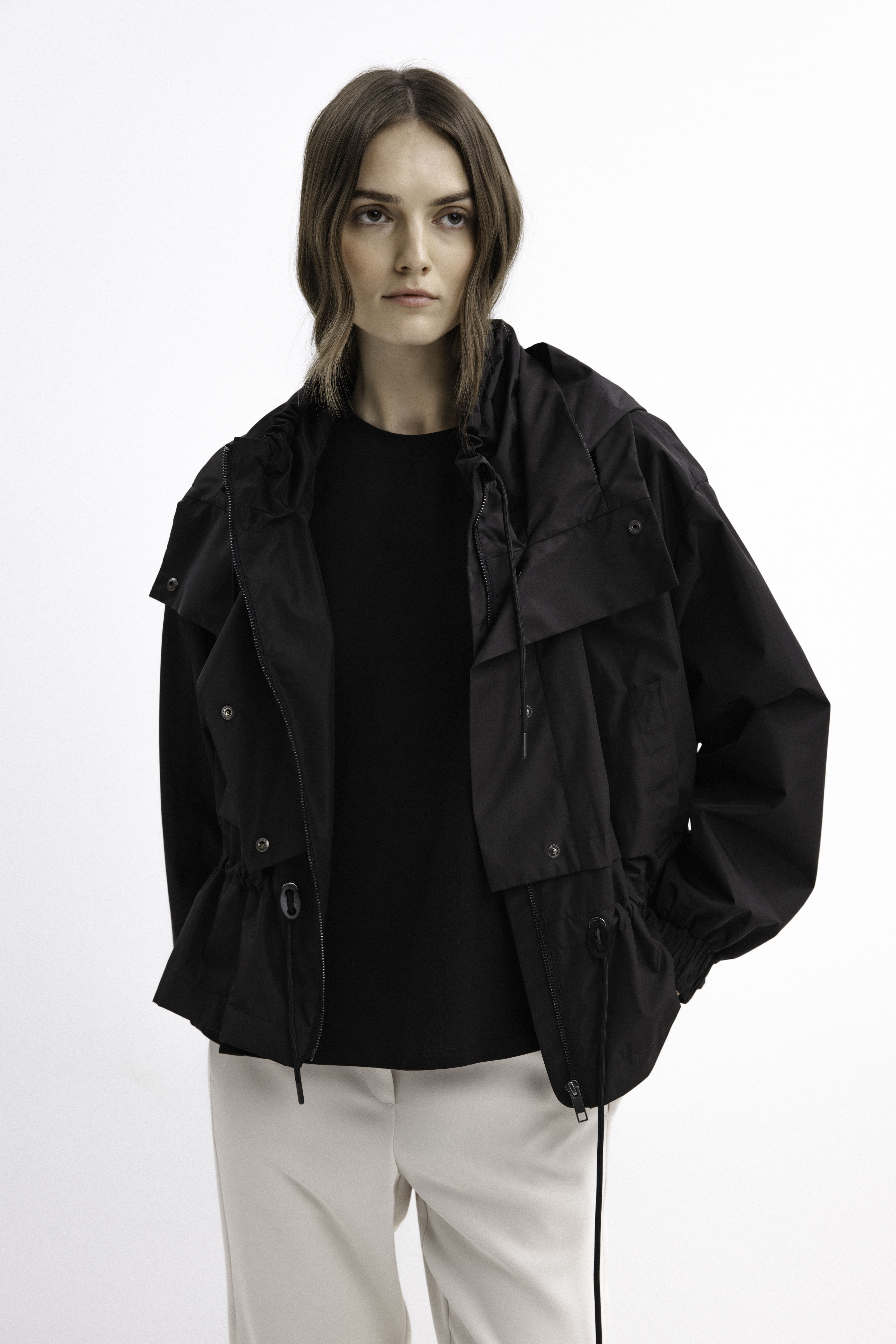 BLACK SHORT RAINCOAT WITH HOOD