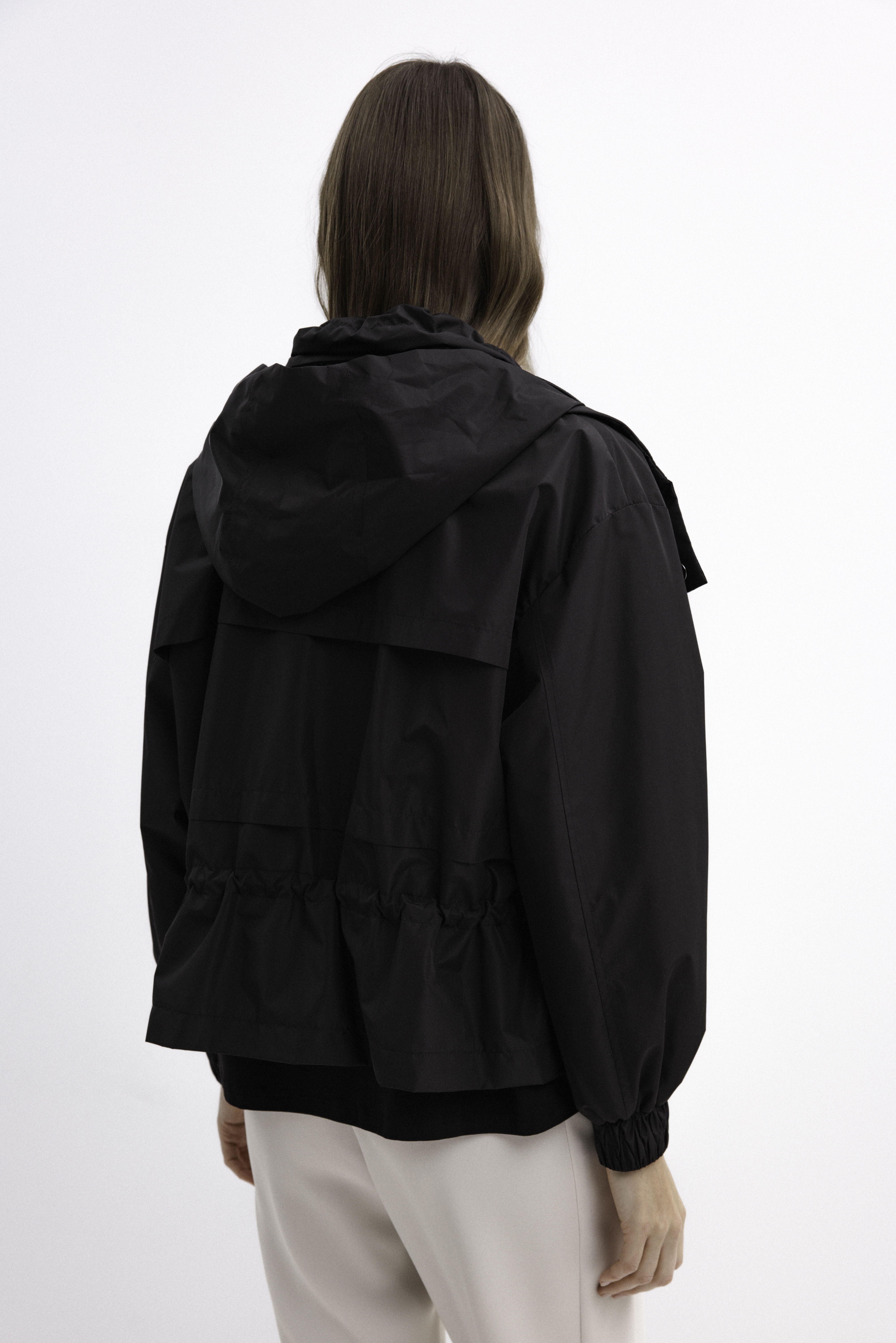 BLACK SHORT RAINCOAT WITH HOOD