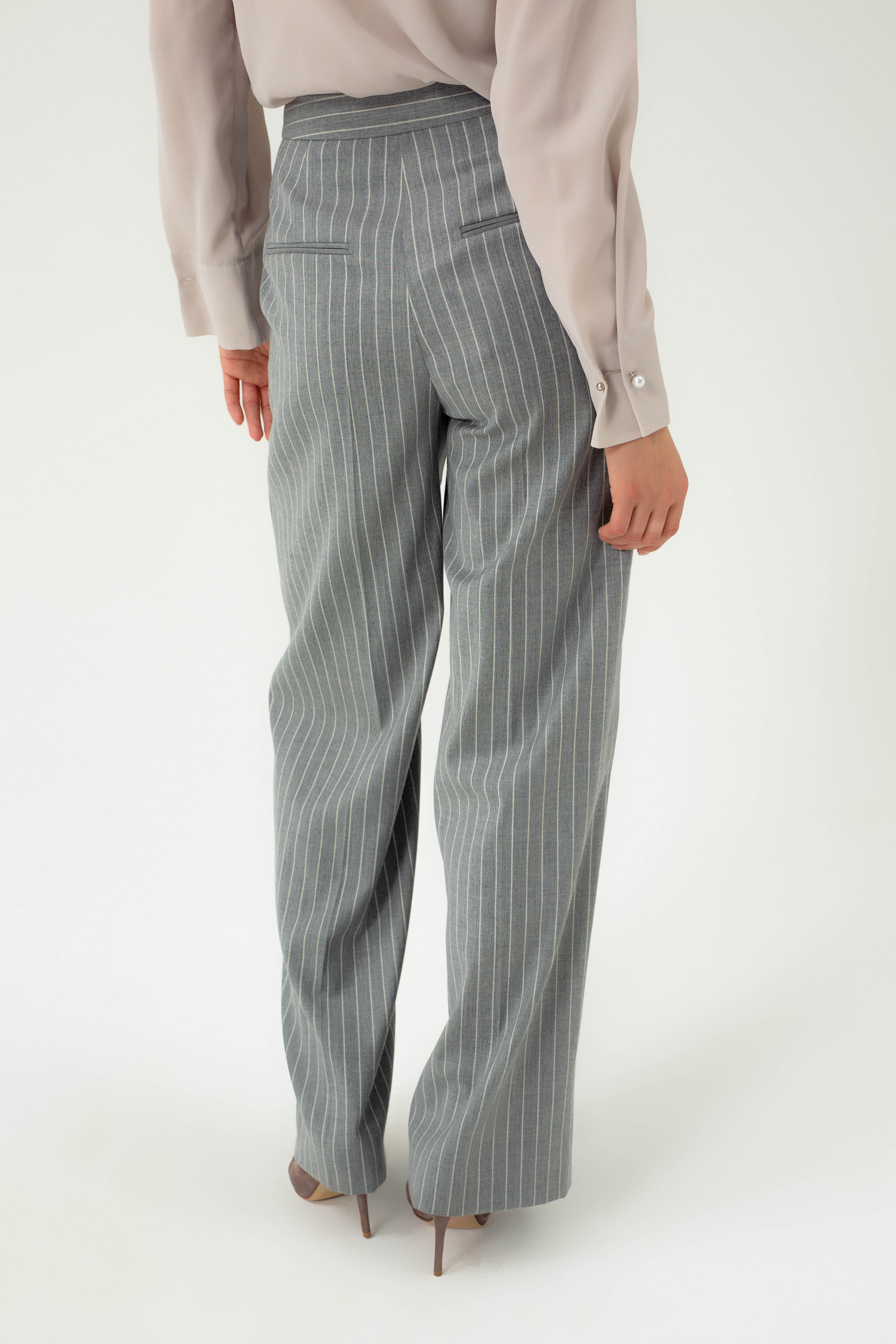 STRIPED WIDE-LEG TROUSERS WITH ASYMMETRIC CLASP