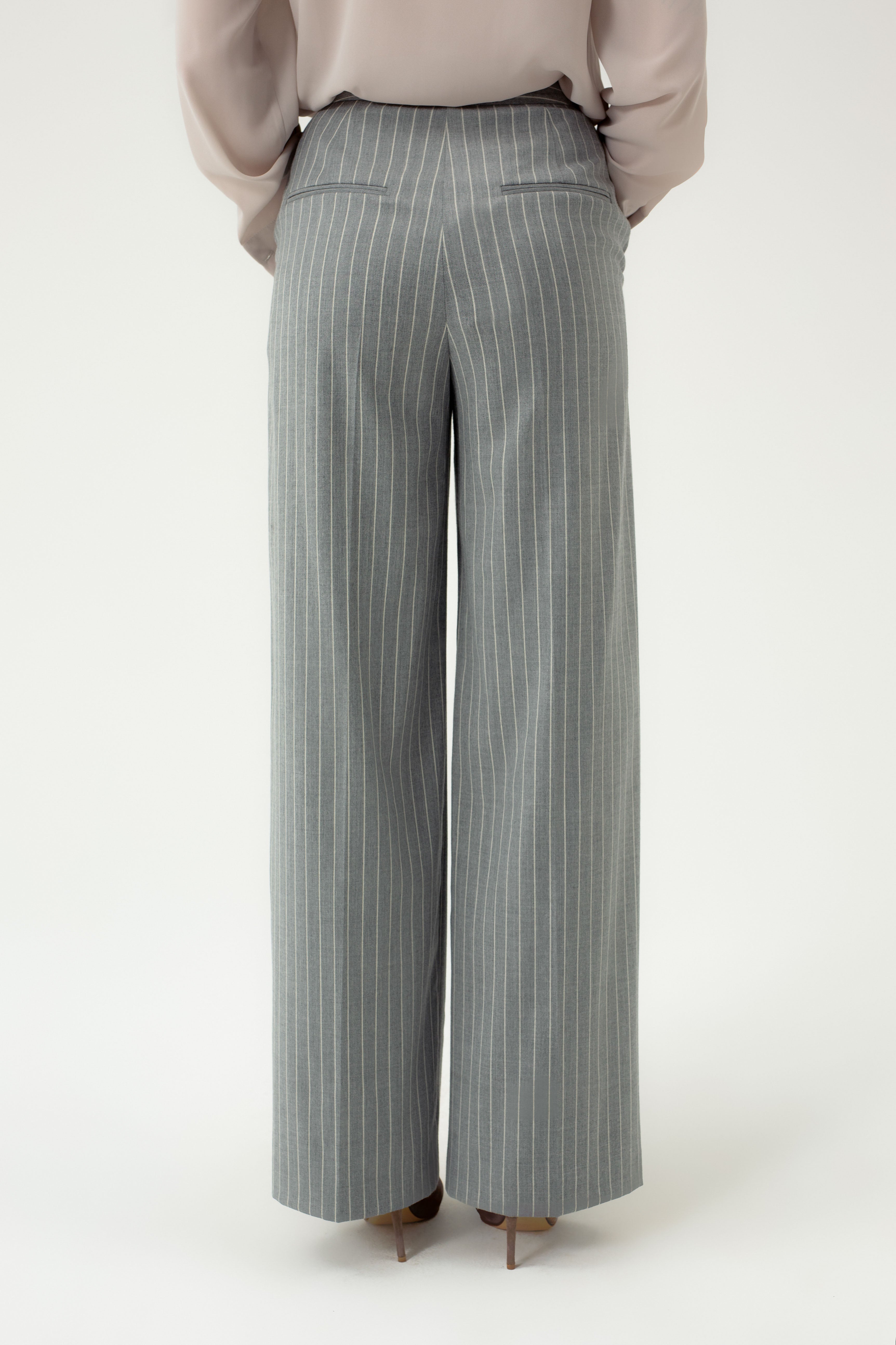 STRIPED WIDE-LEG TROUSERS WITH ASYMMETRIC CLASP