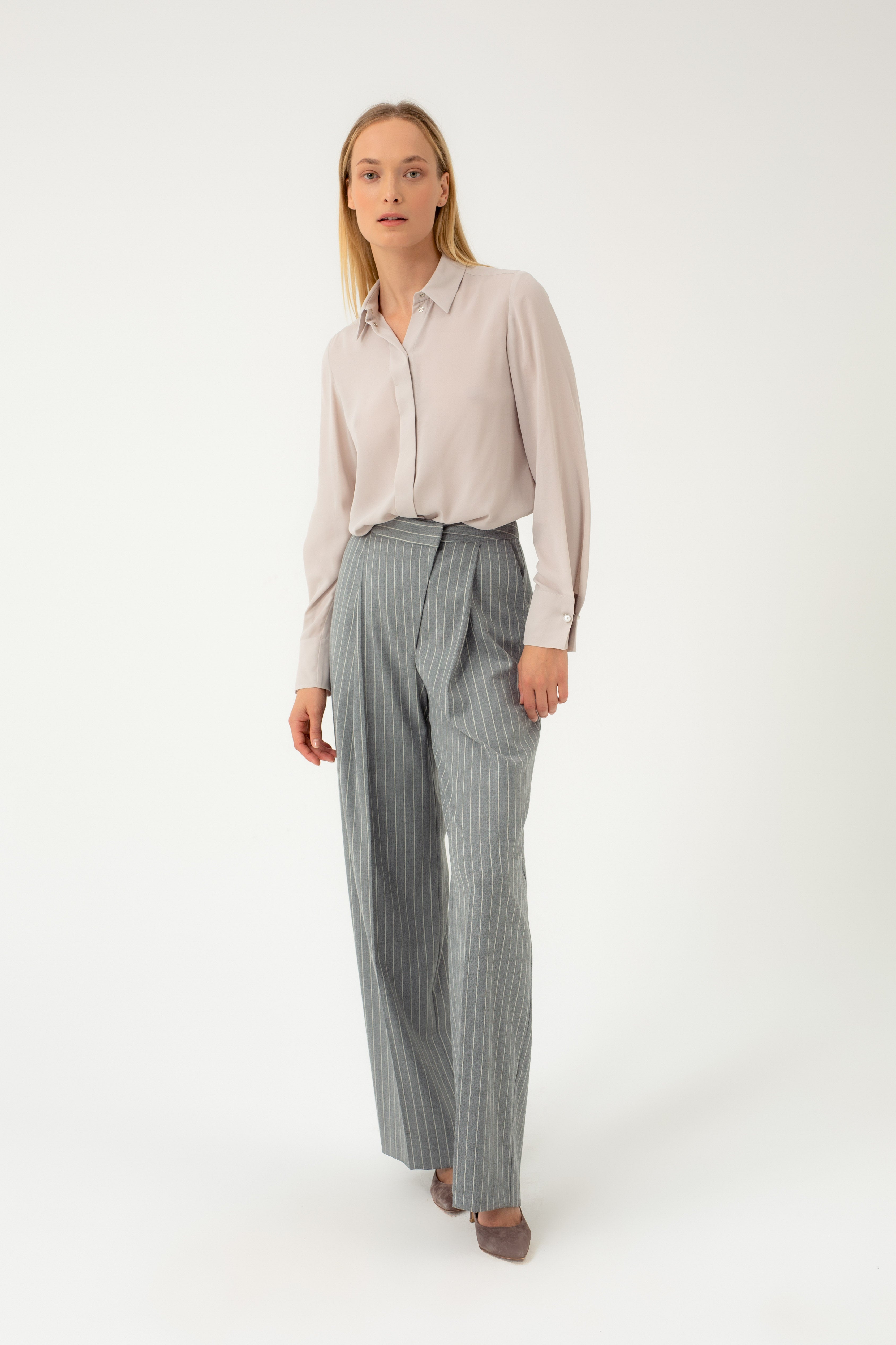 STRIPED WIDE-LEG TROUSERS WITH ASYMMETRIC CLASP