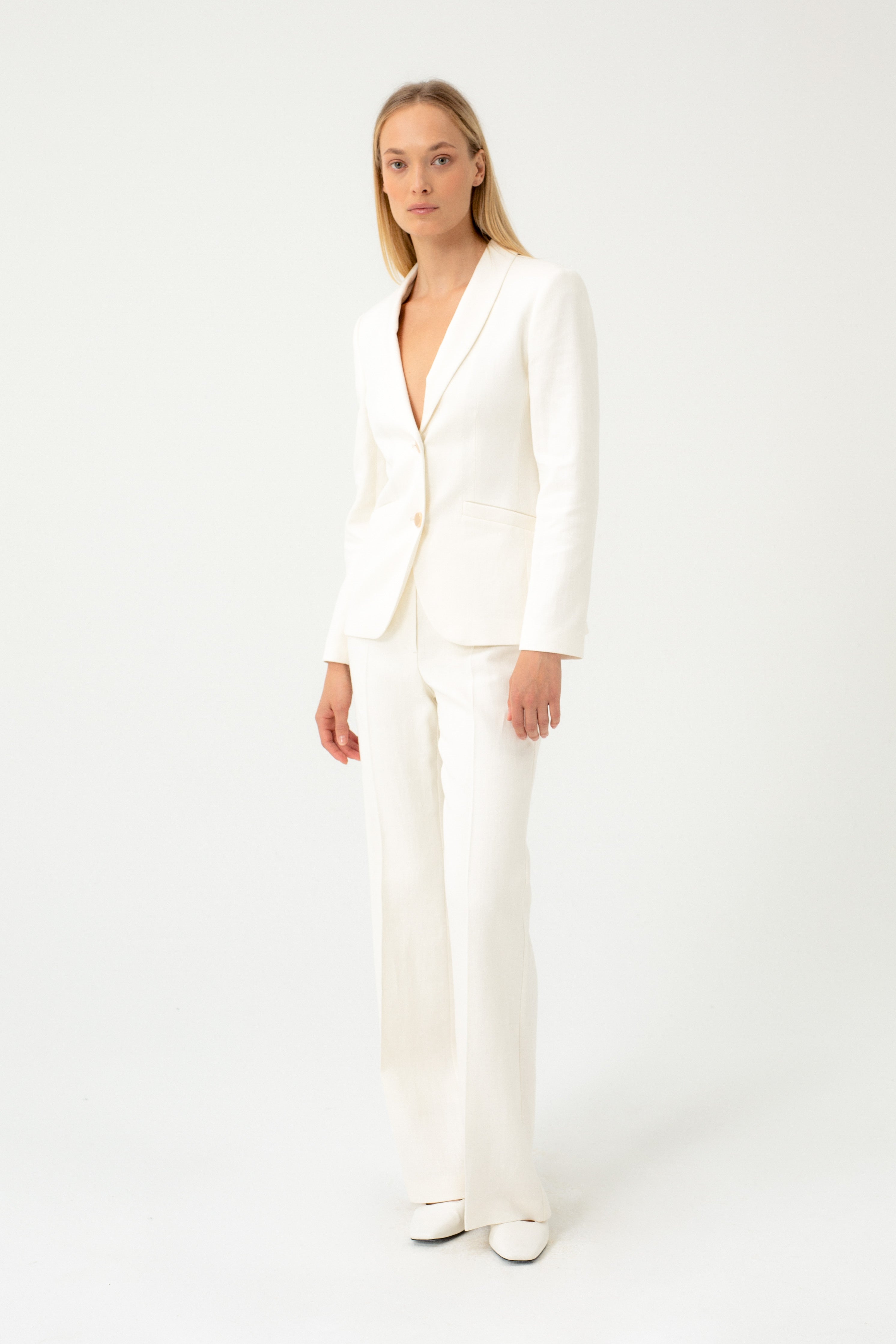 FLARED ECRU TROUSERS