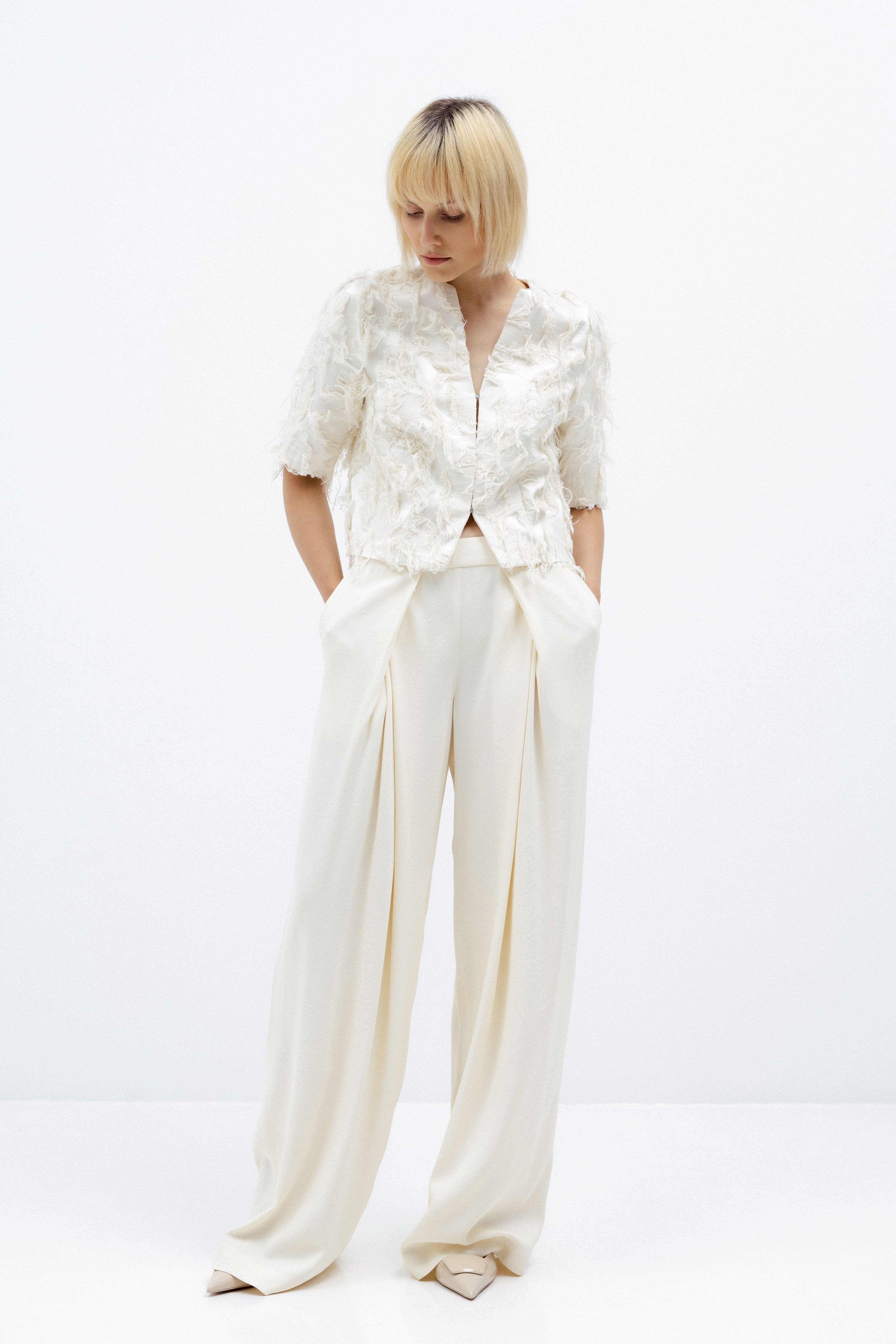 MILK-SHADE WIDE LEG TROUSERS WITH PLEATS