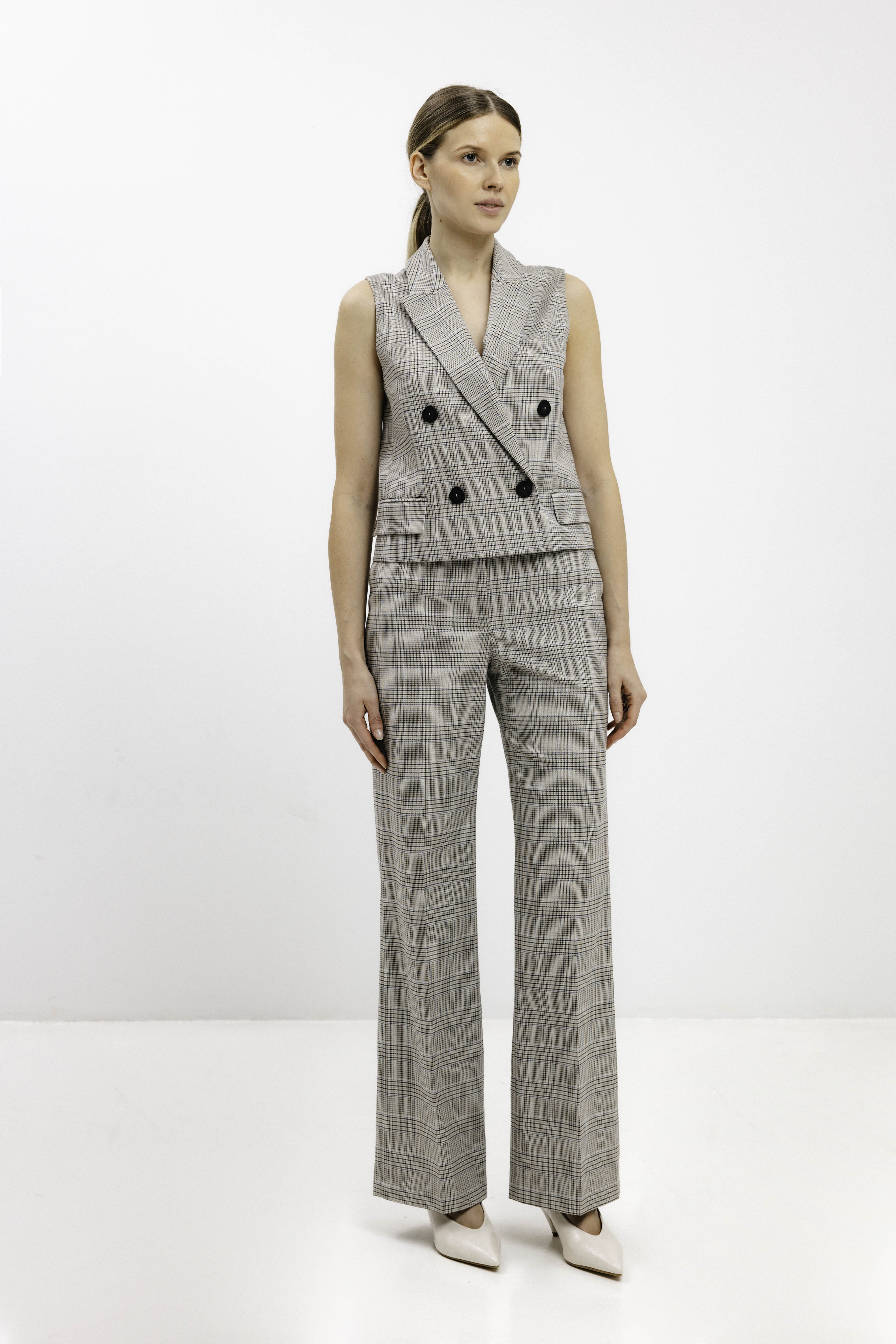 CHECKED VEST WITH DOUBLE-BREASTED CLOSURE