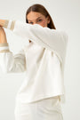OVERSIZED WHITE BLOUSE WITH GOLDEN DETAILS