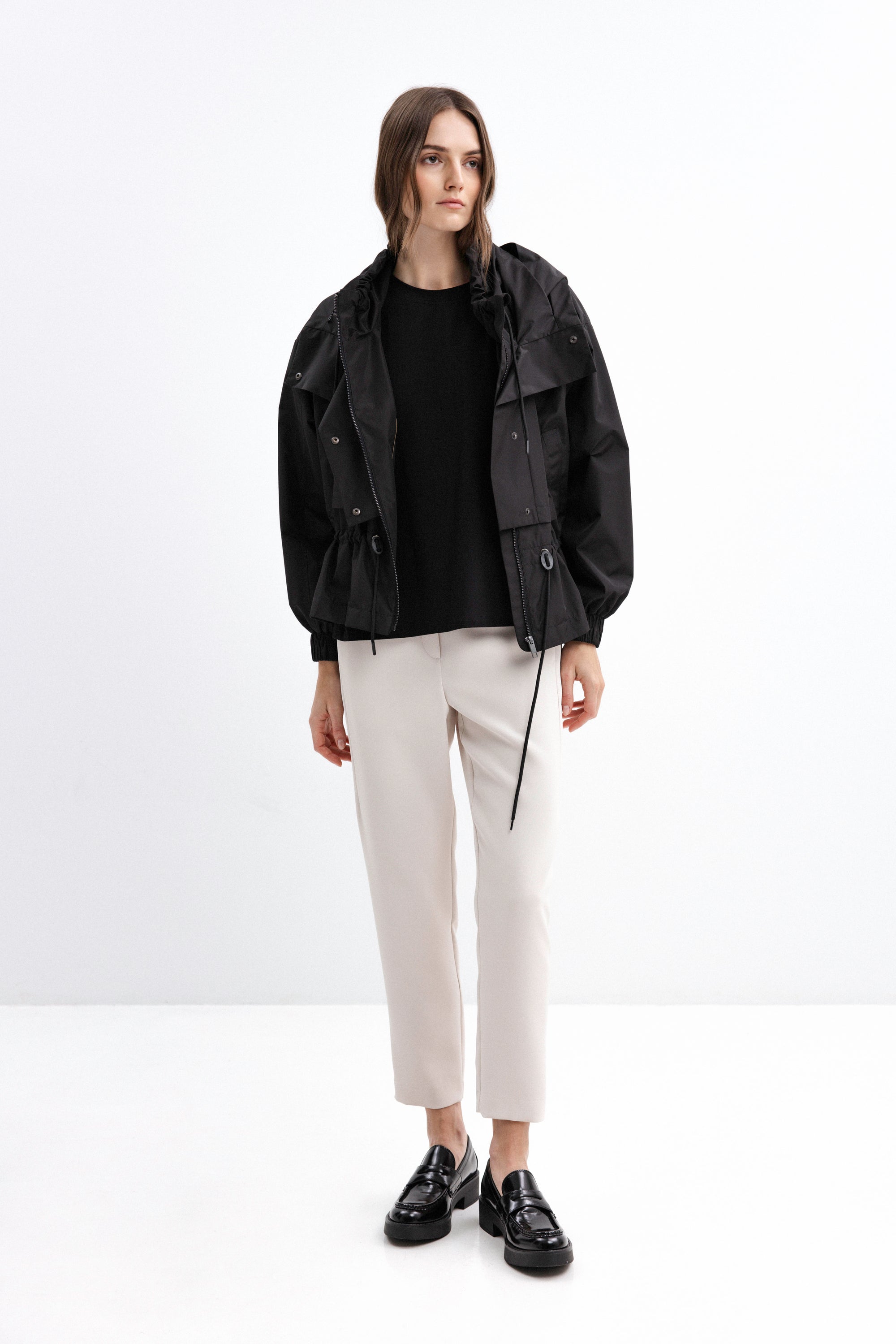 BLACK SHORT RAINCOAT WITH HOOD