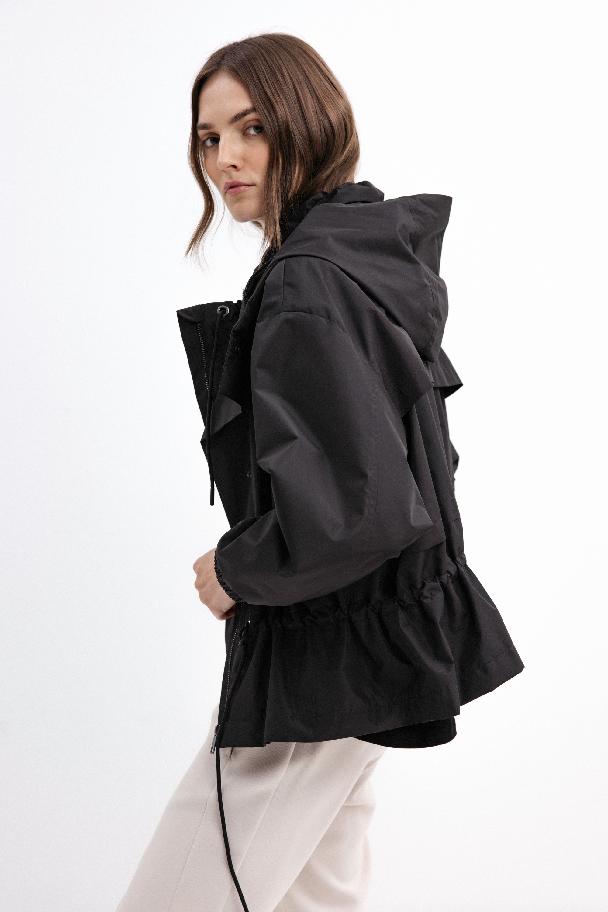 BLACK SHORT RAINCOAT WITH HOOD