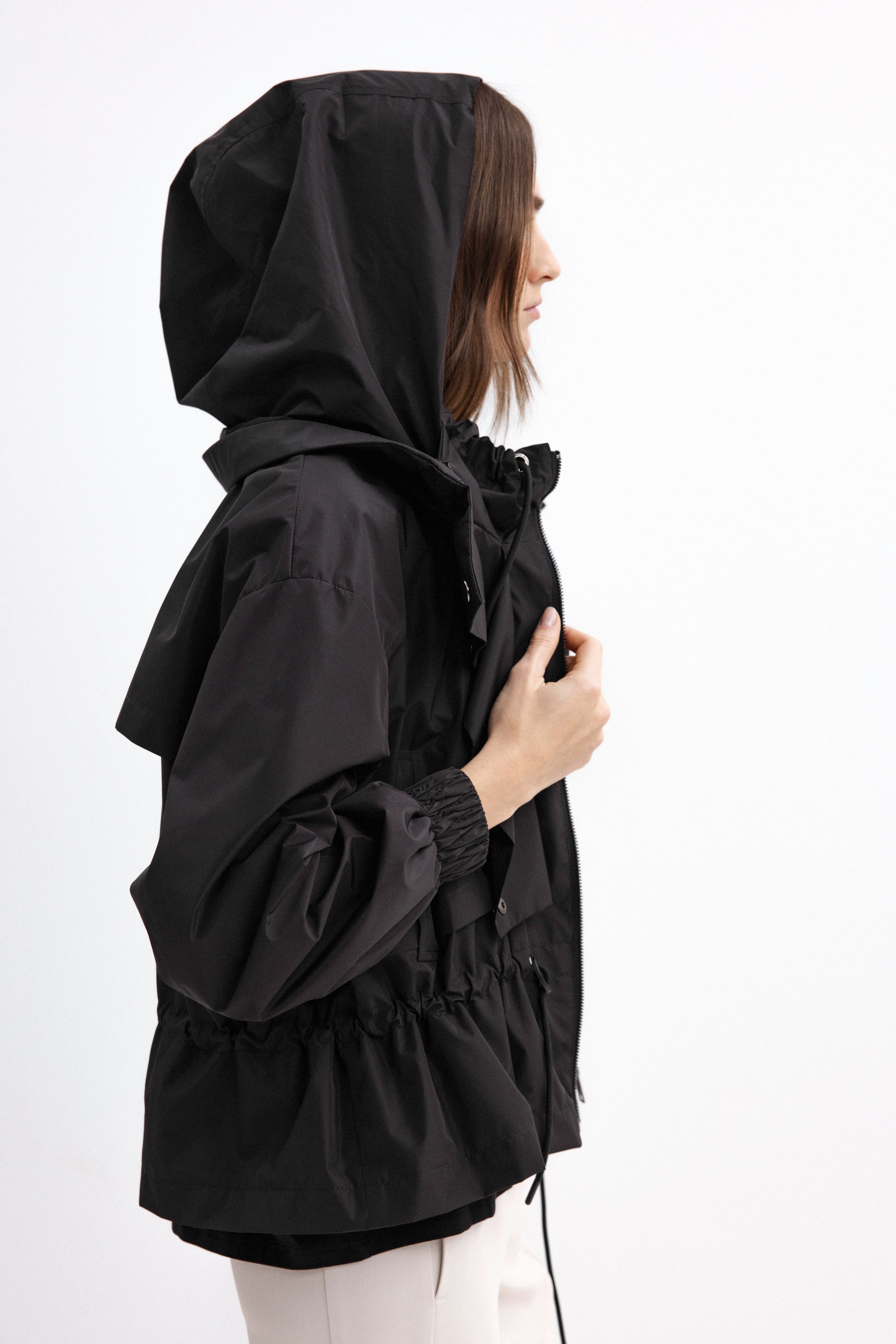 BLACK SHORT RAINCOAT WITH HOOD