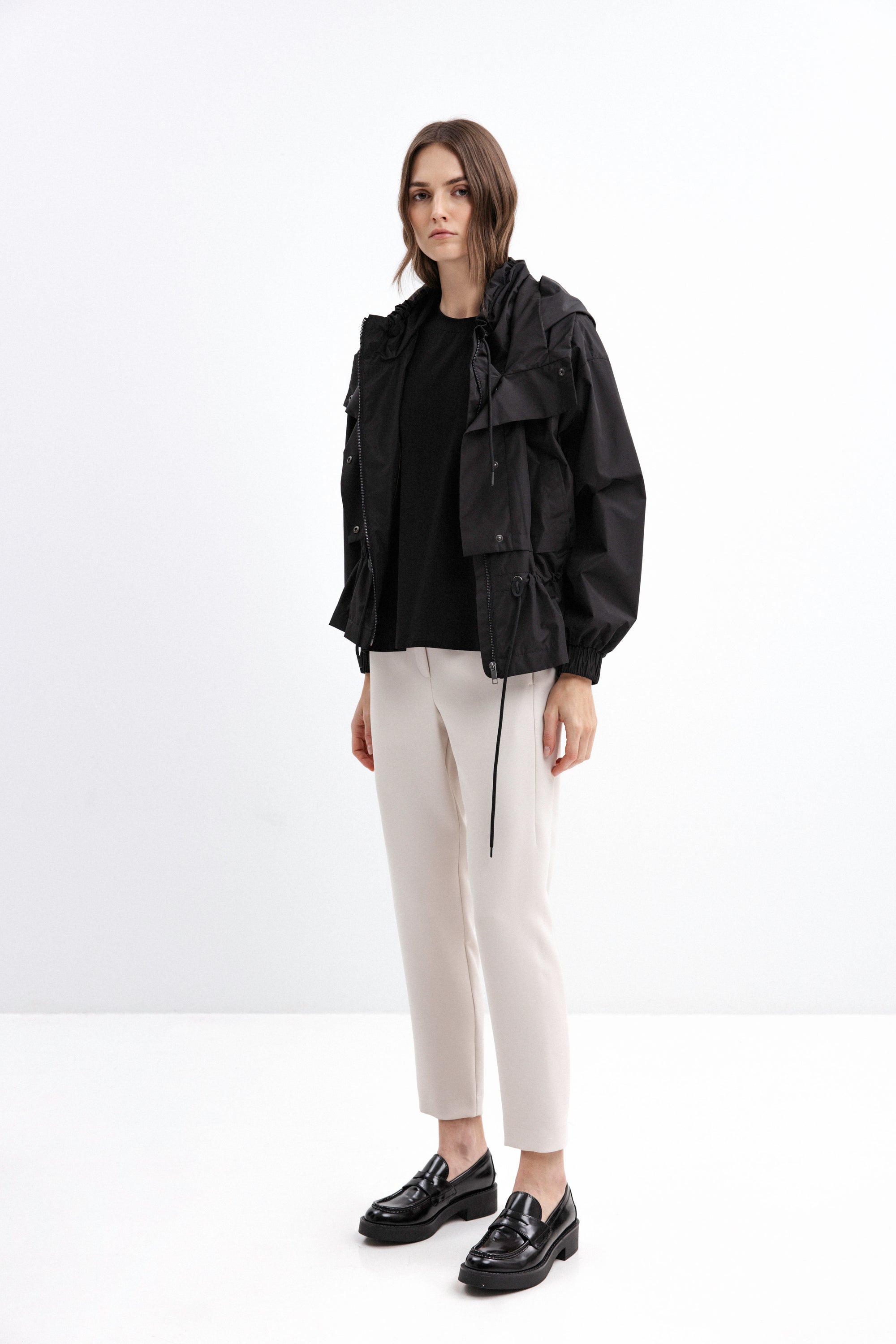 BLACK SHORT RAINCOAT WITH HOOD