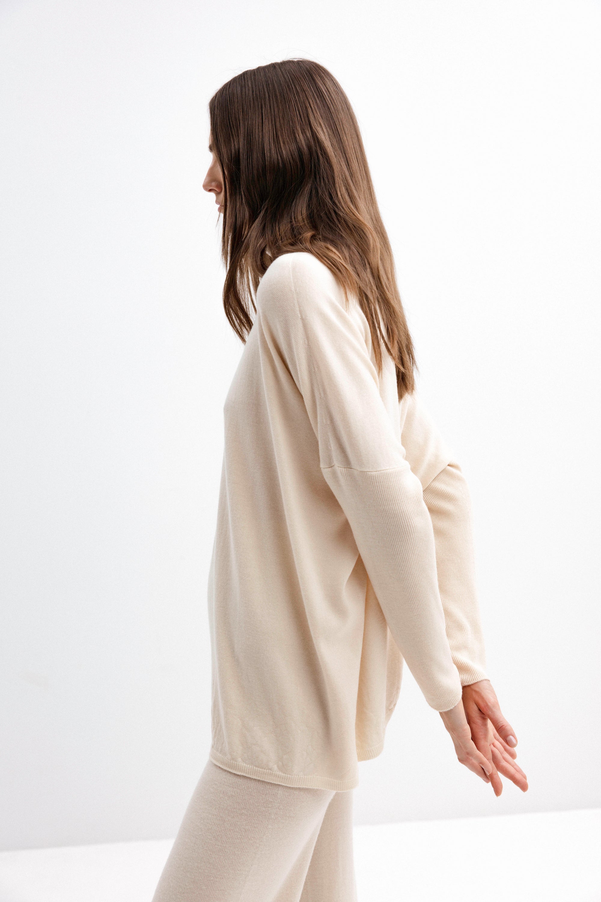 HIGH NECK MERINO WOOL MILK SWEATER