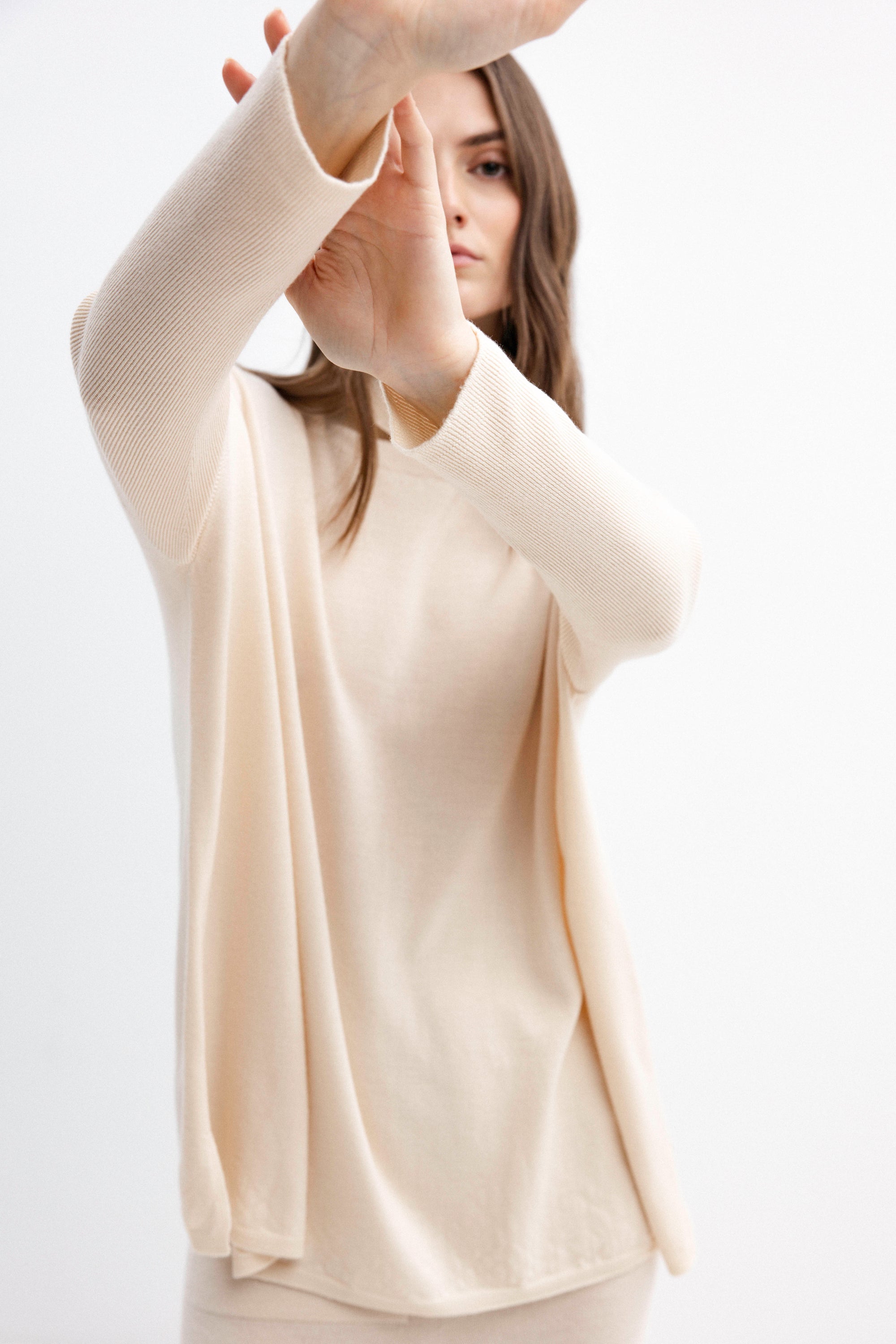 HIGH NECK MERINO WOOL MILK SWEATER