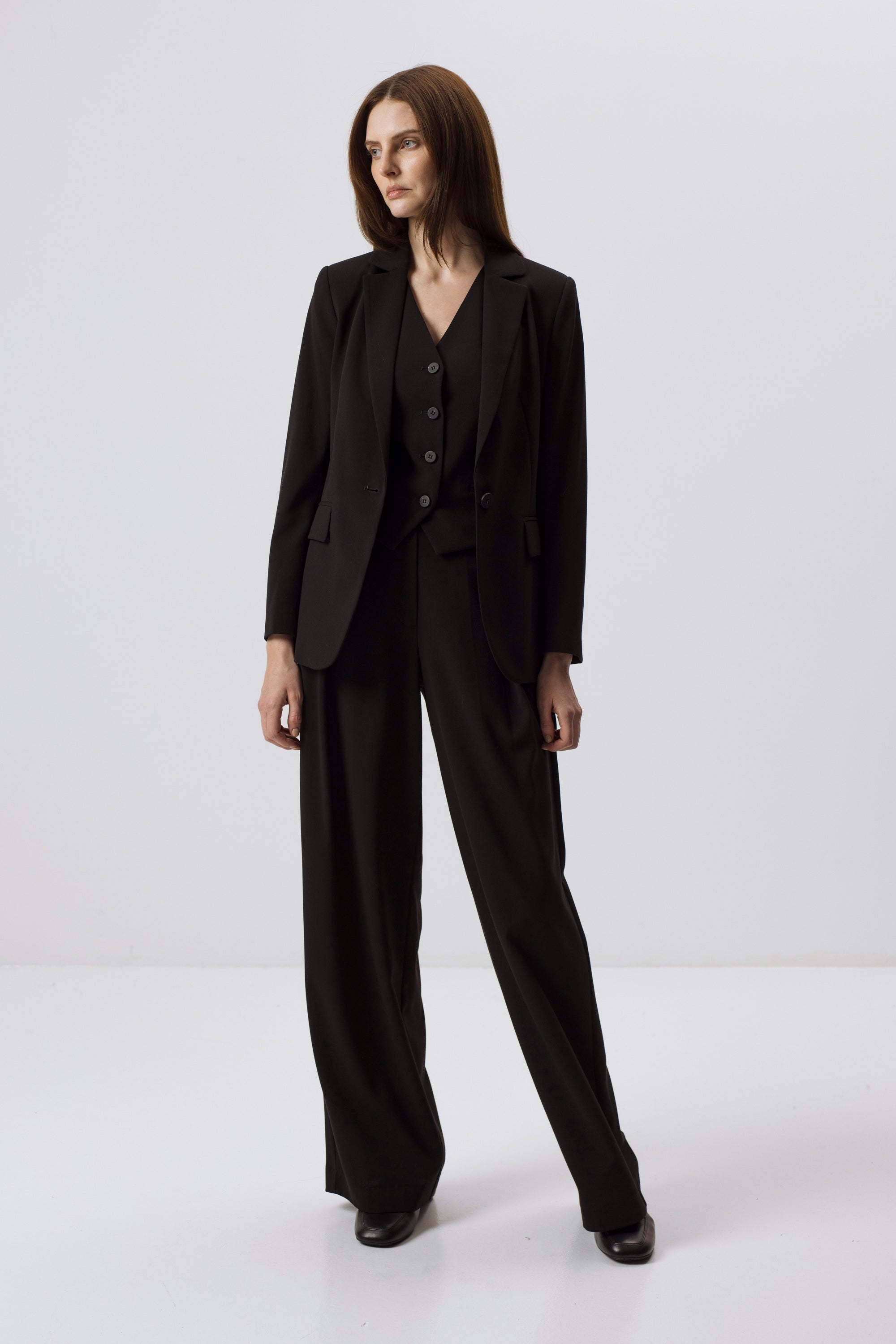 BLACK WIDE-LEG TROUSERS WITH PLEATS