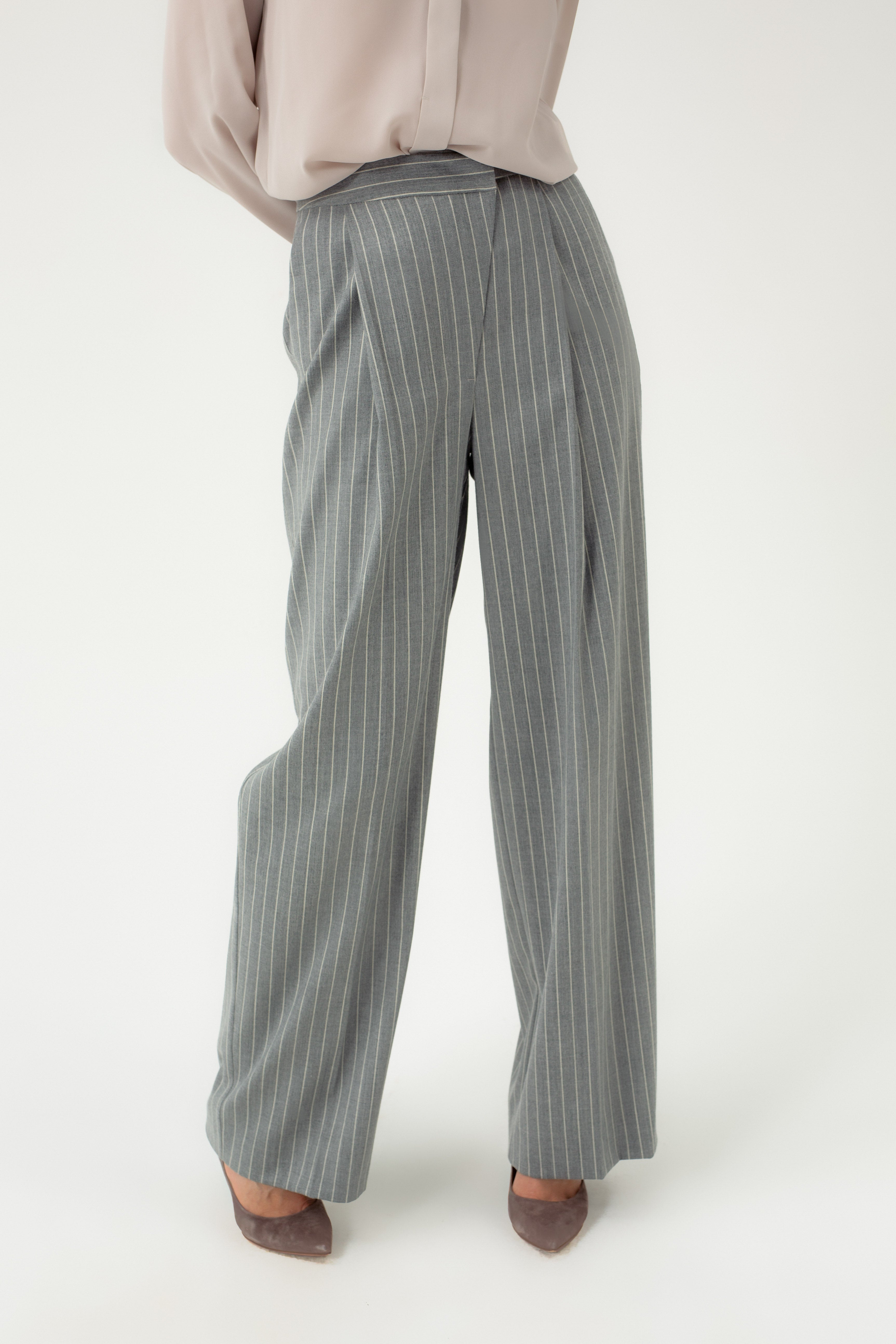 STRIPED WIDE-LEG TROUSERS WITH ASYMMETRIC CLASP