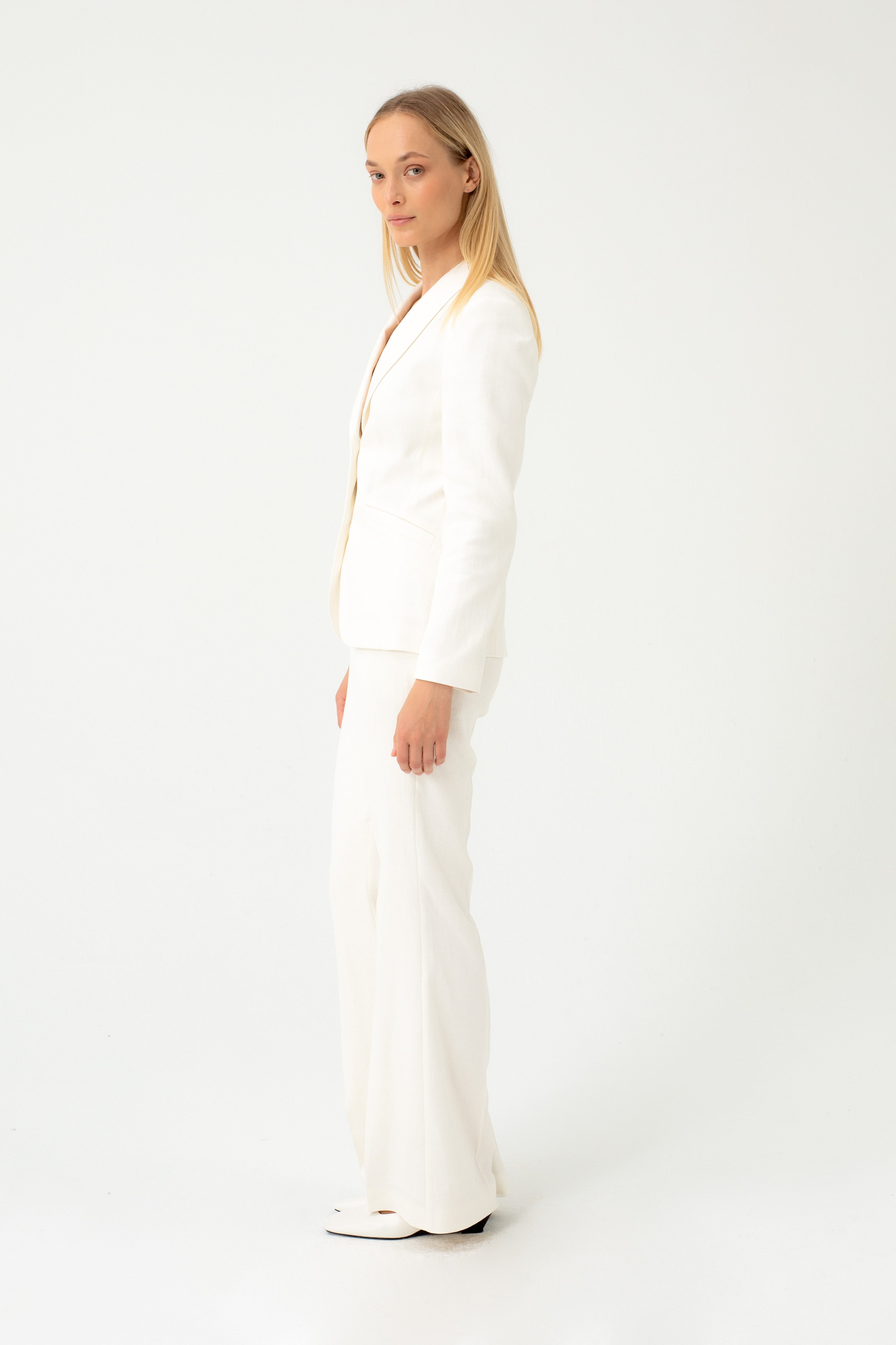 FLARED ECRU TROUSERS